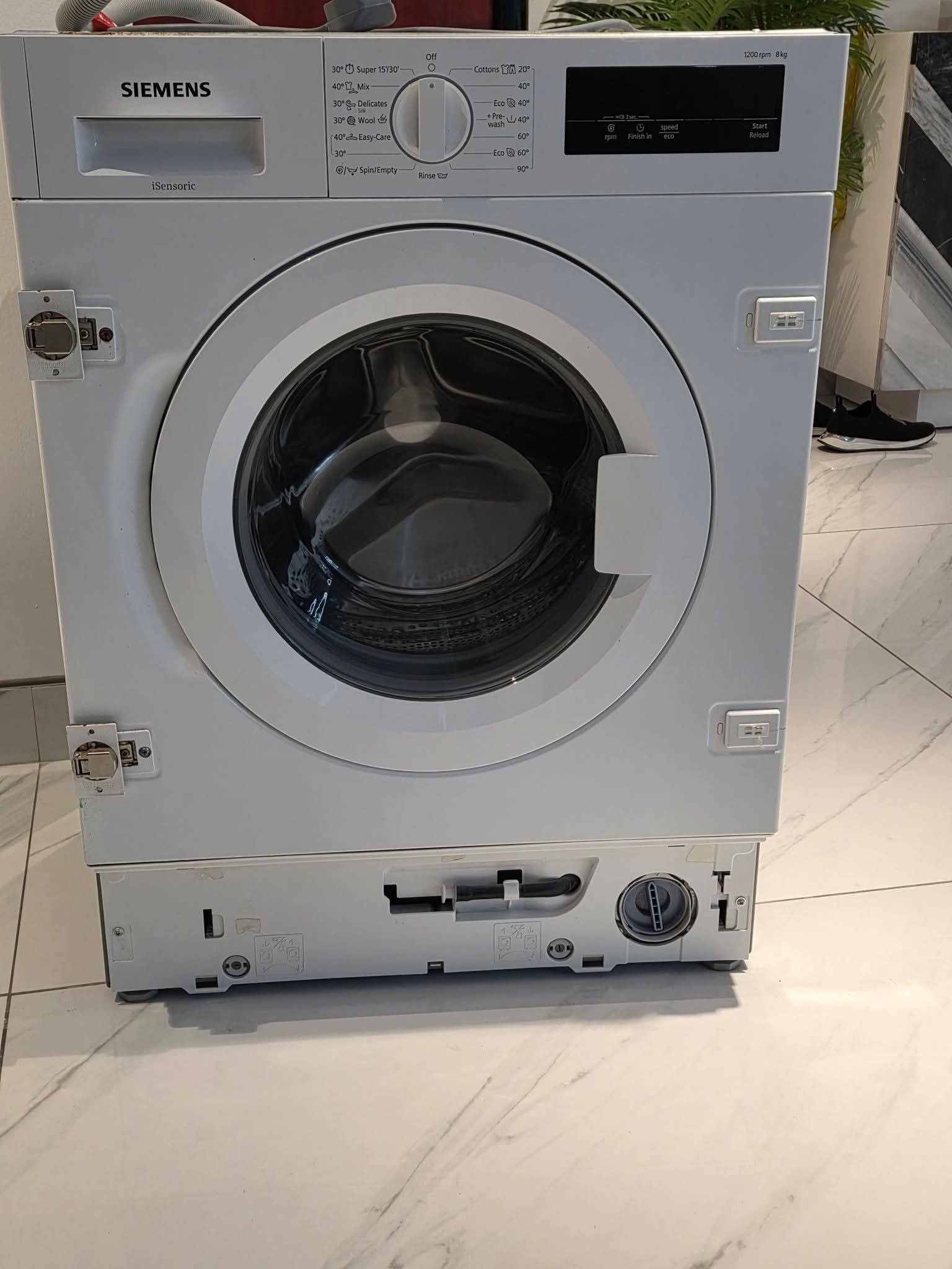 Integrated washing machine and dryer example